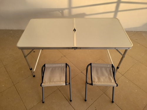 Camping table with two seats