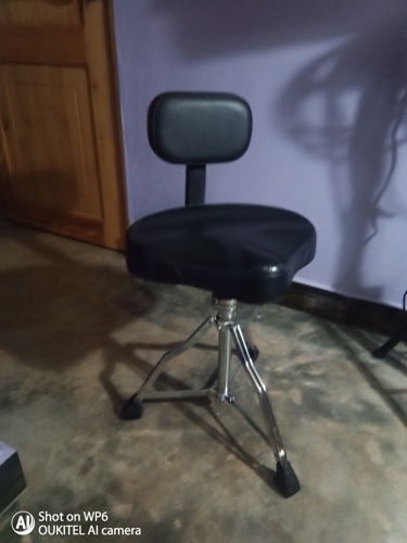 Drum saddle with back support