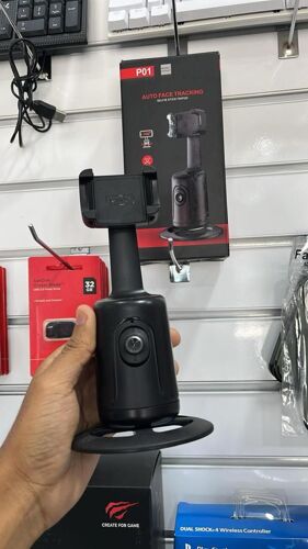 Phone tripod face tracker 