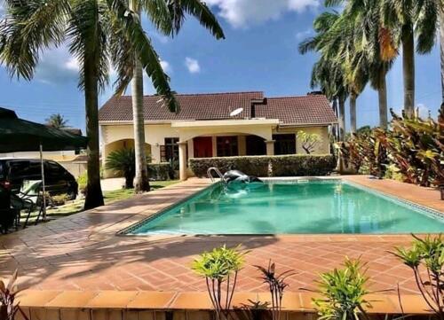 A 2BEDROOMS FULLY FURNISHED VILLAS IN MBEZI BEACH