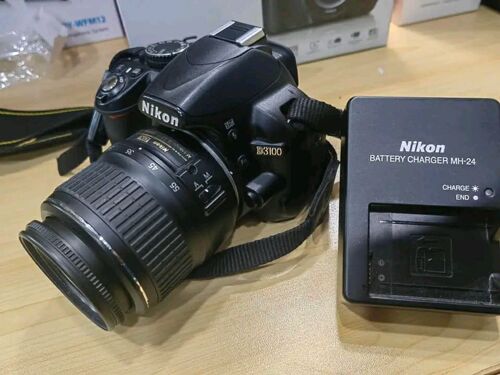 Nikon D3100 with 18-55mm lens 