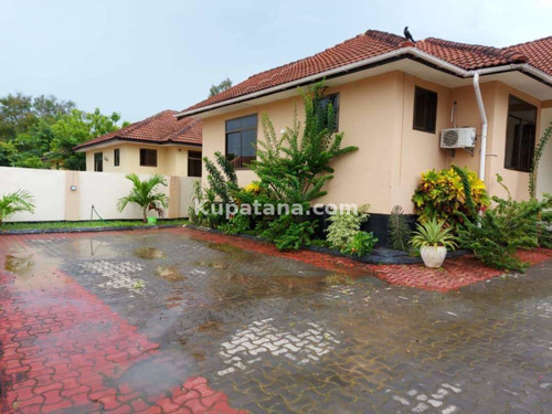 HOUSE FOR SALE AT KUNDUCHI DAR ES SALAAM