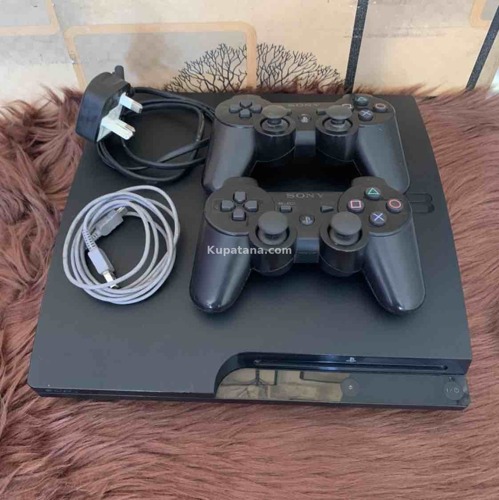Ps3 Slim Chipped With 20 Games Two Pads