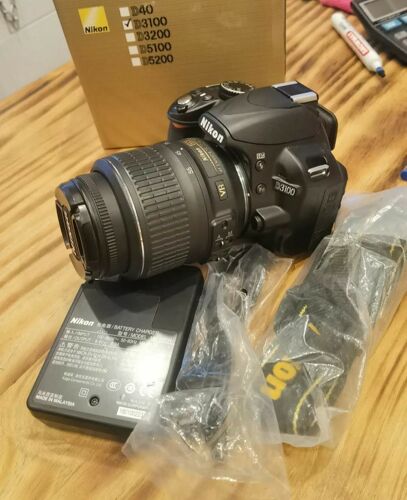 Nikon D3100 with 18-55mm lens 
