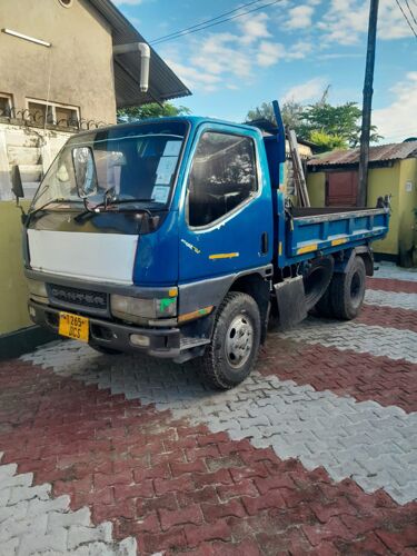 Canter tipper tani 2 ½