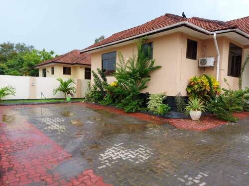 HOUSE FOR SALE AT KUNDUCHI DAR ES SALAAM