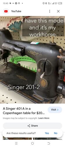 Singer zigzagging sewing machi